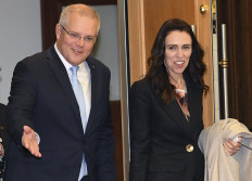 Prime Minister of New Zealand Jacinda Ardern (R) and Australia's Prime Minister Scott Morrison (L) enter a meeting in Melbourne on July 19, 2019. Ardern is on a two-day visit to Melbourne.
