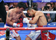 Pacquiao mulls future after title stunner
