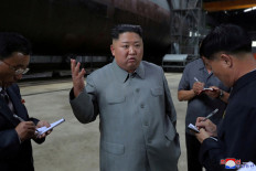 North Korea's Kim Jong Un says missile launch a warning to South Korean 'warmongers'
