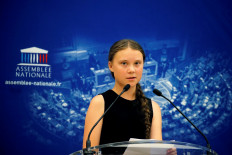 Swedish environmental activist Greta Thunberg delivers a speech before a debate with French parliament members at the National Assembly in Paris, France, on July 23, 2019.