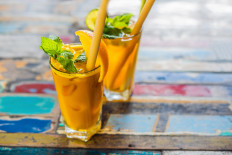 Illustration of 'jamu' (traditional herbal drink).