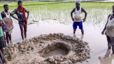  India farmers shocked as meteorite crashes into rice field 