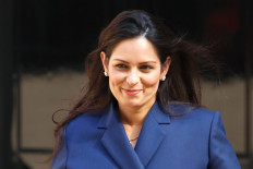 Britain plans to deny asylum to illegal migrants, newspaper says