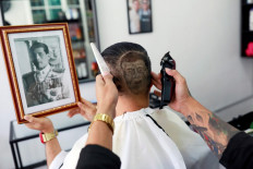 Fit for the king? Thai monarchist's birthday haircut