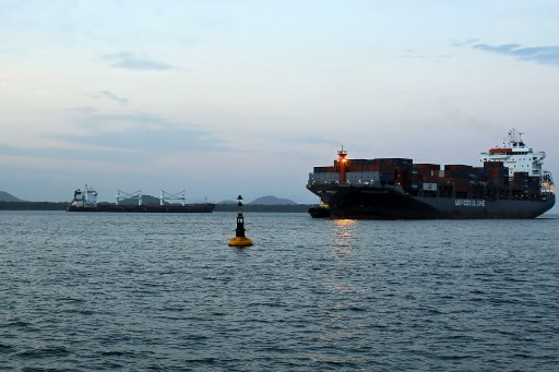Iranian ship Bavand (left), loaded with 48,000 tons of corn, is seen anchored in the port of Paranagua, Brazil, on July 19, 2019.
