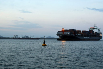 Iranian ship Bavand (left), loaded with 48,000 tons of corn, is seen anchored in the port of Paranagua, Brazil, on July 19, 2019.