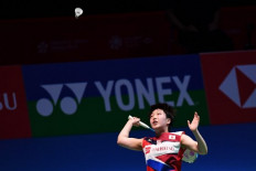 Momota, Yamaguchi raise Olympic hopes with Japanese sweep