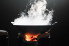 Man pours hot cooking oil on colleague over borrowed motorbike