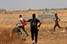 Exchange of fire on Gaza border kills Palestinian, wounds 3 Israel soldiers
