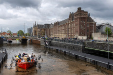Fishing for plastic on Amsterdam's eco-friendly canal cruises