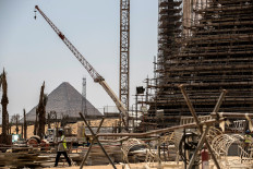 Egypt displays restoration of Tutankhamun gilded coffin