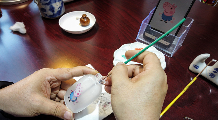 'Painted by ghosts': Chinese bottle art revived through Peppa Pig