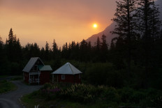 Smoke creates a red hazy sunset from the Swan Lake Fire on the Kenai Peninsula, in Seward, Alaska, US, July 3, 2019. 