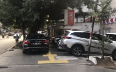 PSI reprimanded after car parked on sidewalk in front of Jakarta HQ