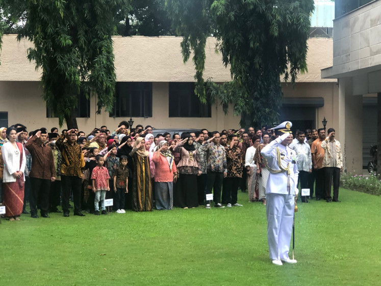 Participants salutes the national flag (unseen) during a ceremony to commemorate 74 years of Indonesia’s independence, in New Delhi, India on Saturday. 