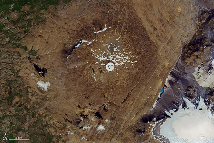This NASA handout image taken on August 1, 2019 shows the top of the Ok Volcano where the Okjokull glacier has melted away throughout the 20th century and was declared dead in 2014. Iceland is planning to mark the passing of Okjokull, its first glacier lost to climate change which threatens some 400 others on the subarctic island.