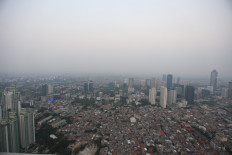 Smog blankets Jakarta’s skyscrapers on Aug. 19. Air pollution in the city is among the worst in the world.