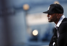 Several hurt as gang storms video set of French rapper Booba