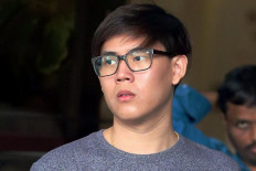 Jail for former Singapore Armed Forces employee who snapped pictures of woman in toilet at workplace