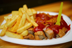 Typical German Currywurst (curried sausage) is pictured in Berlin, Germany, on September 3, 2019.