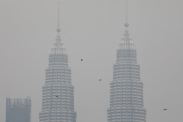Petronas Twin Towers are shrouded by haze in Kuala Lumpur, Malaysia, September 9, 2019. Picture taken on September 9, 2019. 