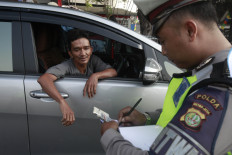 Odd-even parking restrictions deter drivers on Central Jakarta’s busy roads