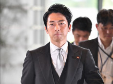 Japan's Abe shakes up cabinet, brings in rising star