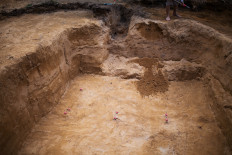 Famed ancient skeletons buried hand-in-hand revealed to be two men