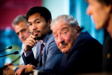 Philippine boxer Manny Pacquiao second, left) and boxing promoter Bob Arum (second, right) attend a press conference to promote Pacquiao's upcoming WBO Welterweight title fight against Australian challenger Jeff Horn at Suncorp Stadium in Brisbane on June 28, 2017. Manny Pacquiao's world title fight with Jeff Horn will be 