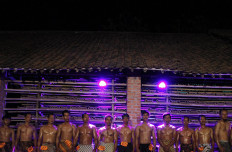 Participants await the announcement of the winners of the 2019 Jatiwangi Cup bodybuilding championship for roof tile factory manufacturers held at the Dua Saudara jebor, Burujul Kulon, Majalengka, West Java, recently. All participants received gifts and money as a form of appreciation for their participation even if they were not among the best three. JP/Arya Dipa