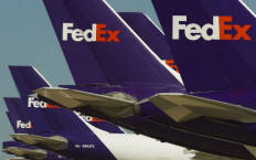 China says FedEx pilot suspected of smuggling weapons