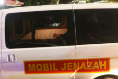 The hearse bearing the remains of the late BJ Habibie exits Gatot Subroto Army Hospital (RSPAD) in Jakarta on Wednesday, September 11, 2019. JP/Dhoni Setiawan