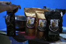 Kopi Petruk is the brand that Sukiman, a coffee farmer in Deles, Klaten regency, Central Java, uses for his coffee products. JP/Magnus Hendratmo