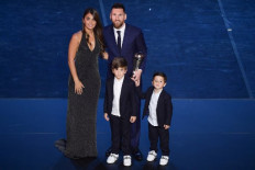 Messi wins FIFA player of the year as Ronaldo skips ceremony