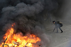 Burning anger: Protesters burn chairs, tables and other items taken from a police post at the House of Representatives/People’s Consultative Assembly compound in Senayan, Central Jakarta, on Wednesday.