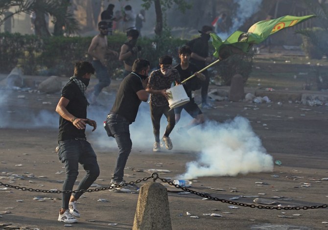 Thousands in bloody protests across Iraq, 31 dead