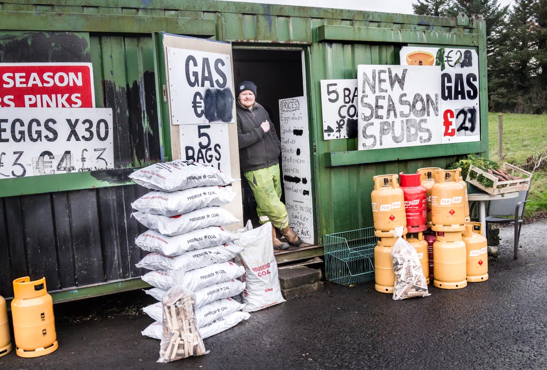 A man sells goods near the border between Northern Ireland and the Republic of Ireland on Buncrana Road in the western suburbs of Derry/Londonderry. JP/Okky Ardya