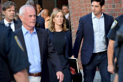 Actress Felicity Huffman begins prison term