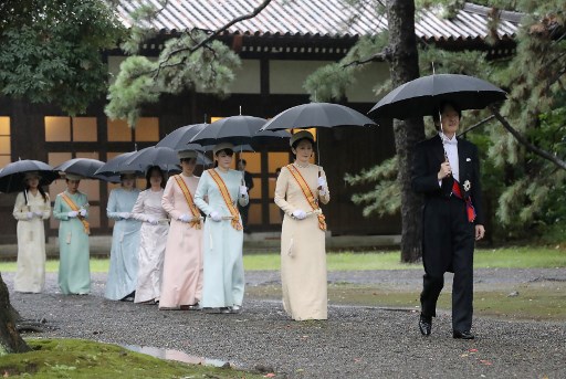 Japan plans to postpone imperial parade over typhoon