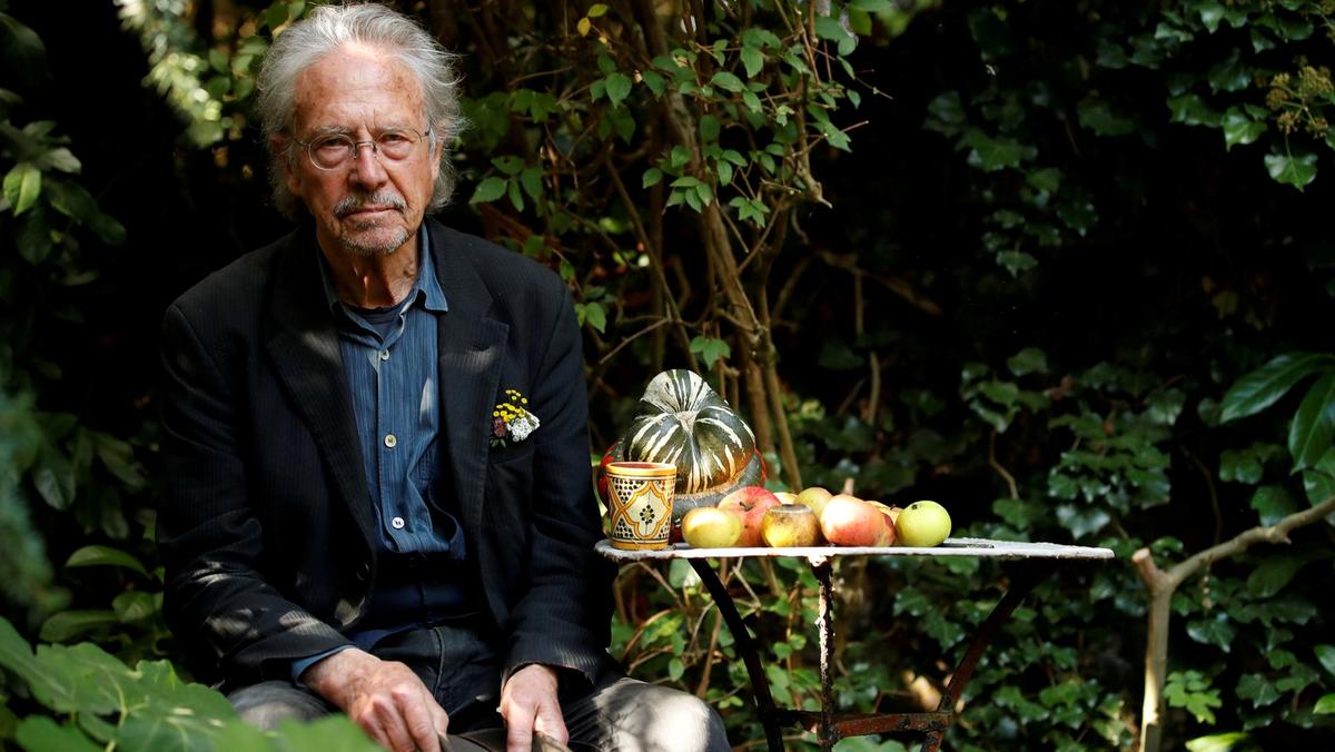 Austrian author Peter Handke poses in his garden, following the announcement he won the 2019 Nobel Prize in Literature, in Chaville, near Paris, France, on October 10, 2019.