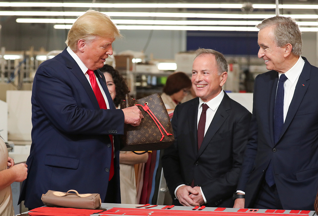 Trump's Vuitton visit stirs discord at the brand as designer hits out