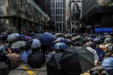 Hong Kong deports Indonesian worker who reported on protests