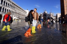Venice’s fraught future caught between tourist crowds and rising tides