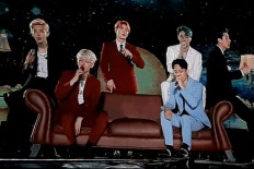 Fans fall head over heels for EXO once again at Saturday night concert