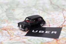Uber losses widen in pandemic, amid recovery signs 			