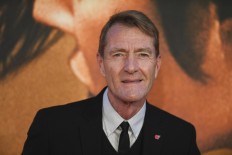 British author Lee Child (real name Jim Grant), author of the Jack Reacher novel series, poses upon arrival for the European premiere of the film 'Jack Reacher: Never Go Back' in central London on October 20, 2016.