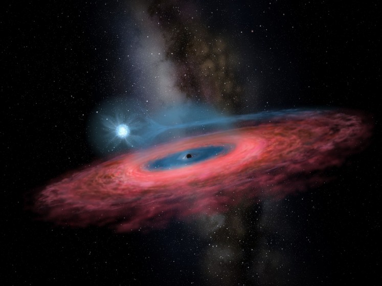 This handout received from the Beijing Planetarium via the China Academy of Sciences on November 26, 2019 shows a rendering by artist Yu Jingchuan of the accretion of gas onto a stellar black hole from its blue companion star, through a truncated accretion disk. 