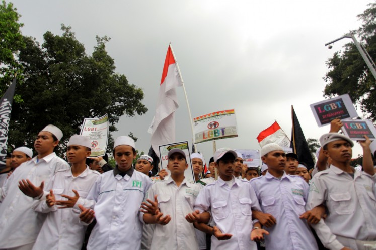 Hate and fear: Thousands of anti-LGBT demonstrators march in Bogor, outside the capital Jakarta, on Nov. 9, 2018. Indonesia's LGBT community is under attack as a spike in hateful rhetoric and record number of arrests raise fears that the vulnerable group could be targeted for violence, critics say.