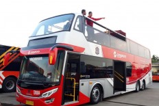 A double-decker bus operated by city-owned bus operator PT Transjakarta in Jakarta.