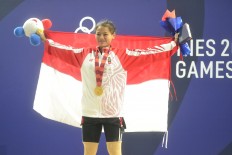 SEA Games: Windy wins weightlifting gold for Indonesia in her debut